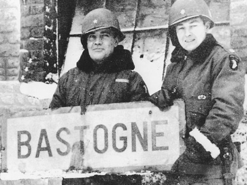 <p style="text-align: center;"><strong>Brigadier General Anthony McAuliffe and Lieutenant Colonel Harry Kinnard II at Bastogne, Belgium, late Dec 1944.</strong><br style="text-align: center;" /><span style="text-align: center;">Source / Cr&eacute;dit :&nbsp;</span><a style="text-align: center;" href="https://ww2db.com/image.php?image_id=22276" target="_blank" rel="noopener">United States War Department</a></p>